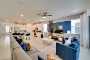 House (Multiple Bedrooms) | Living area | Ping pong - Orlando Area Getaway ~ 17 Mins to Theme Parks! (Kissimmee)