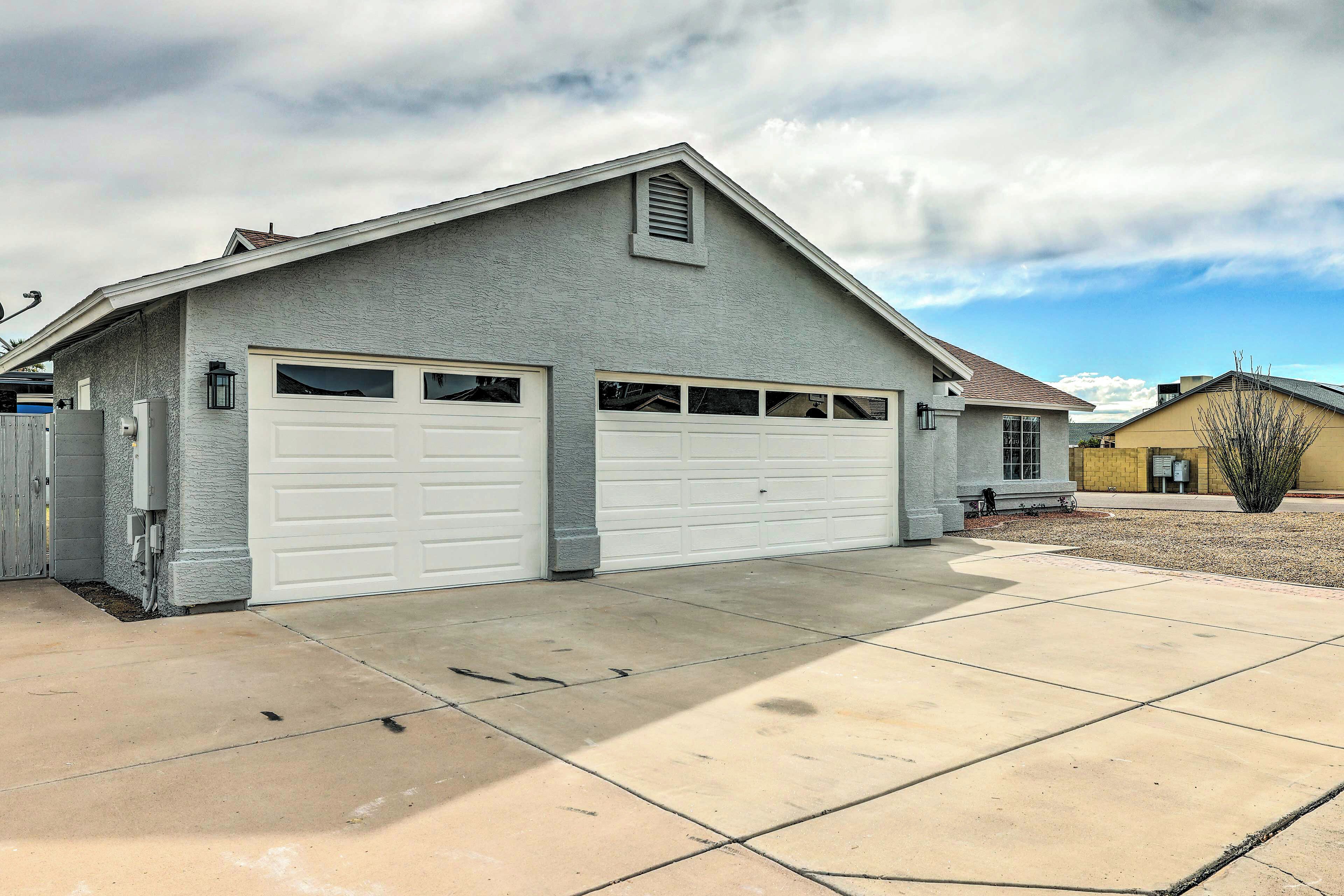 A single-story garage with a sloped roof and two garage doors.
