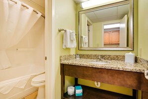 A bathroom with a sink, mirror, and towel rack. - Waterfront Myrtle Beach Condo, Pool & Ocean Views! (Myrtle Beach)