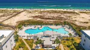 A resort with a pool area, beach access, and ocean views. - Walk to Beach! Gulf Shores Escape w/ Indoor Pool (Gulf Shores)