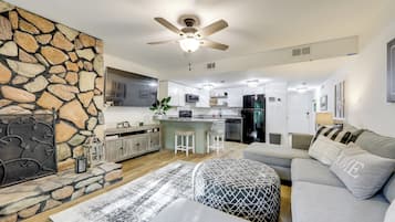 Apartment (1 Bedroom) | Living area | TV, fireplace