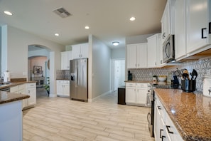 House (3 Bedrooms) | Private kitchen | Microwave, oven, stovetop, dishwasher - Luxe Surprise Home: Pool, Putting Green & Hot Tub! (Surprise)