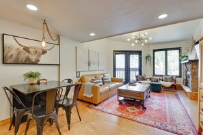 Apartment (1 Bedroom) | Living area | TV, fireplace