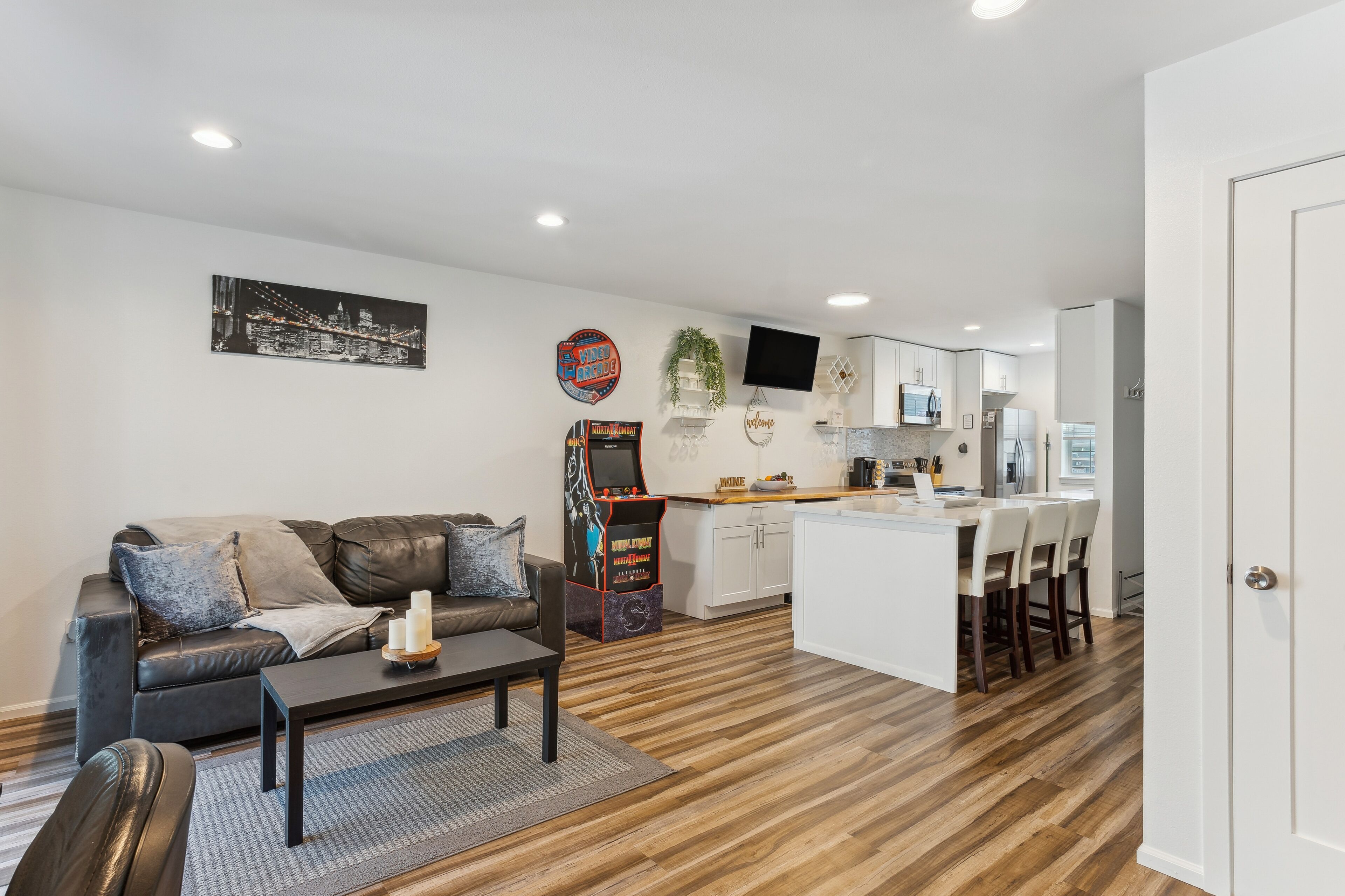 TV, fireplace, video game console, books