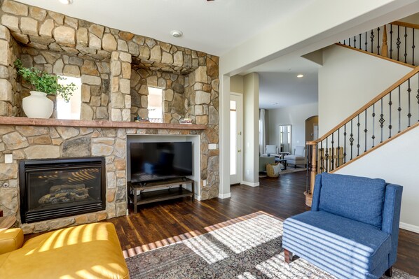 TV, fireplace, books - Estrella Mountain Ranch Vacation Rental w/ Pool! (Goodyear)