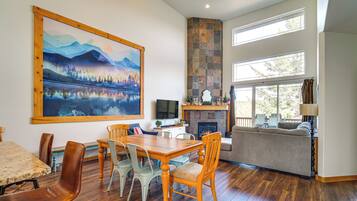 TV, fireplace, books