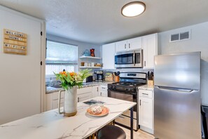 Cottage (1 Bedroom) | Private kitchen | Microwave, oven, stovetop, high chair - Cozy Oklahoma Getaway w/ Covered Patio (Norman)