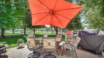 Enjoy al fresco dining in a serene, setting surrounded by lush greenery.