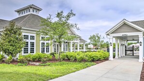 A two-story building with a covered entrance and a number '30752' above the door. - Shuttle to Beach: Millville By the Sea Retreat (Millville)