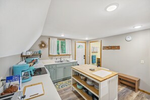 Microwave, oven, stovetop, cookware/dishes/utensils - Cozy Michigan Escape w/ Deck, Fire Pit & Grill! (Ludington)