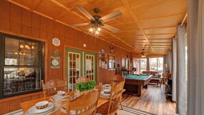 A wooden interior with a pool table, dining table, and chairs. - Cadiz Vacation Home w/ Deck: Walk to Lake Barkley (Cadiz)