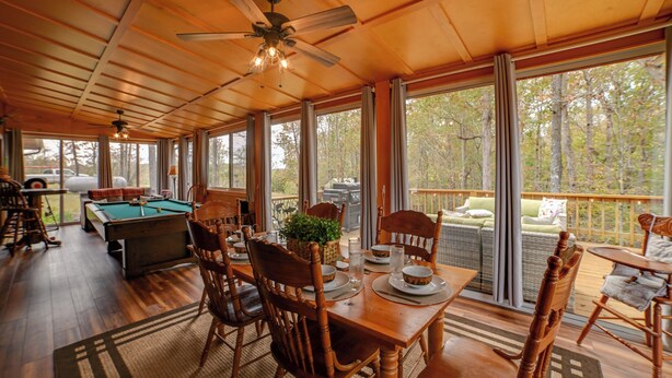 A wooden deck with a pool table, dining table, and chairs. - Cadiz Vacation Home w/ Deck: Walk to Lake Barkley (Cadiz)