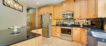 Riverfront Bliss in Rice Lake: Deck, Grill & Hike!