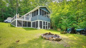 A two-story house with a covered porch and a fire pit in the yard. - Monterey Haven < 1/2 Mi to Lake Garfield w/ Kayaks (Monterey)