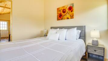 1 bedroom, laptop workspace, bed sheets