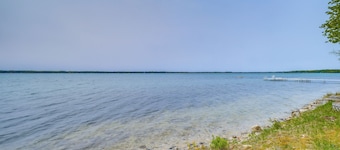 Waterfront Torch Lake Cottage w/ Dock & Fire Pit!