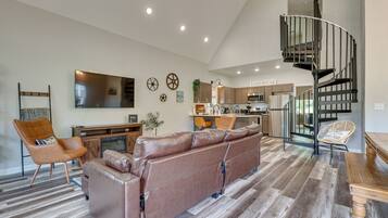 Téléviseur, foyer, lecteur de DVD, livres