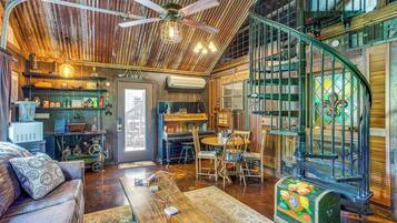 House (2 Bedrooms) | Living area | Fireplace, video game console, DVD player, books