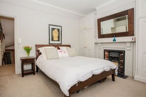 4 bedrooms, desk, iron/ironing board, travel cot