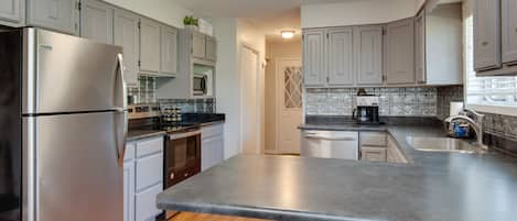 House (4 Bedrooms) | Private kitchen | Microwave, oven, stovetop, dishwasher