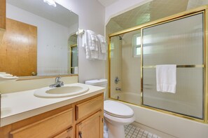 A bathroom with a sink, toilet, and shower. - East Palatka Vacation Rental, Angler's Paradise (East Palatka)