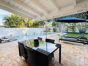 A heated pool - Tropical Oasis Private Pool Family Yard 3BR 1BTH 2 Car DRV (Wilton Manors)