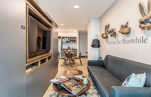 Deluxe one bedroom apartment- Ground Floor | Living area | 50-cm Smart TV with digital channels, Netflix, streaming services