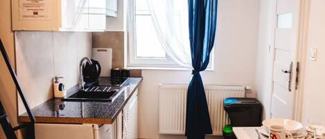 Fridge, oven, cookware/dishes/utensils