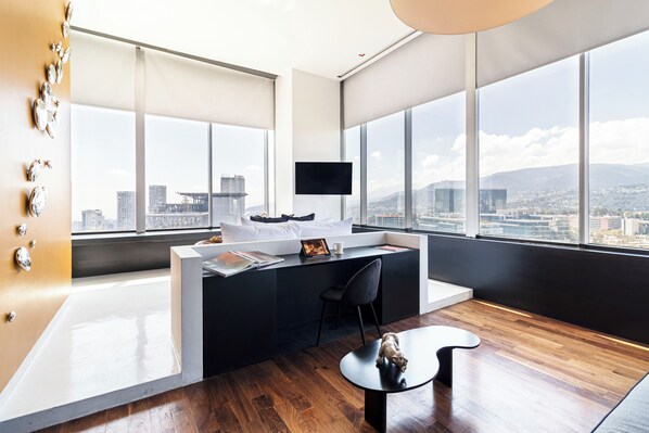 Suite Deluxe | 1 habitación, ropa de cama de alta calidad y camas con efecto memoria 