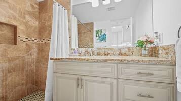 Hair dryer, towels, soap, shampoo