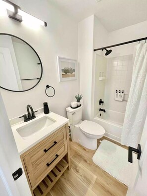 Hair dryer, towels, soap, shampoo
