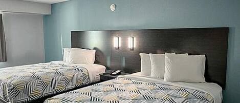 Pillow-top beds, desk, laptop workspace, blackout curtains