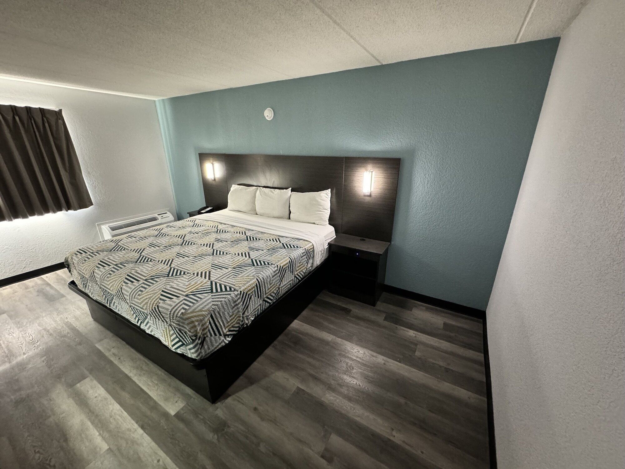 Pillow-top beds, desk, laptop workspace, blackout curtains