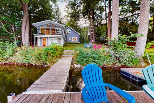 Renovated lakefront cottage w/ hot tub, dock, kayaks, swim platform, & firepit