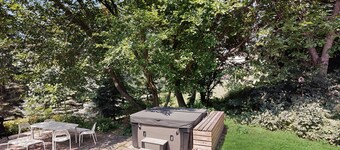 Dog-friendly downtown home with hot tub & deck