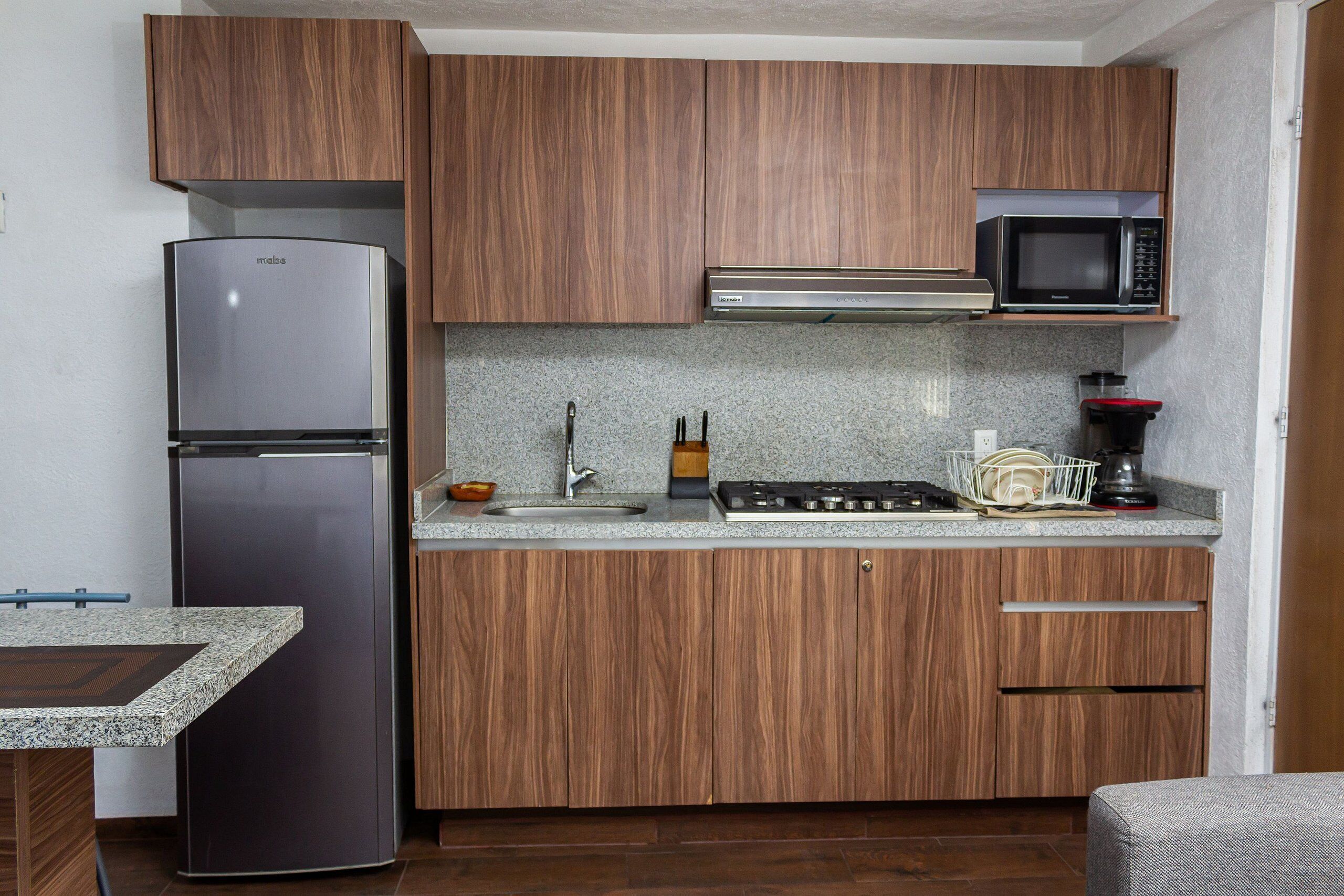 Fridge, microwave, cookware/dishes/utensils