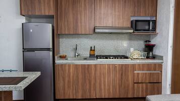 Fridge, microwave, cookware/dishes/utensils
