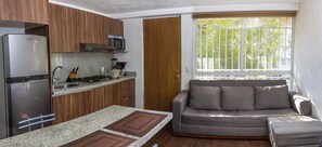 Fridge, microwave, cookware/dishes/utensils