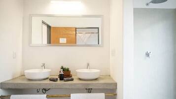 Shower, towels, soap, toilet paper