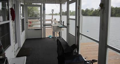 On the Belle River, docking for 2,3 boats. One mile south of Spunky Monkey.