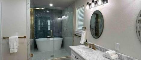 Hair dryer, towels, soap, shampoo