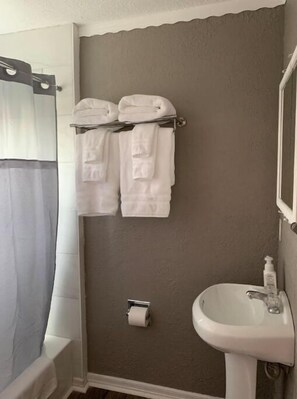 Hair dryer, towels, soap, shampoo