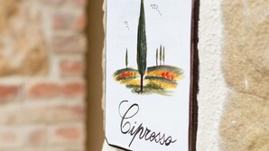 A sign with the word "Cappuccino" on it.
