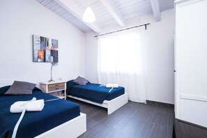 2 habitaciones, tabla de planchar con plancha, cuna de viaje y wifi 