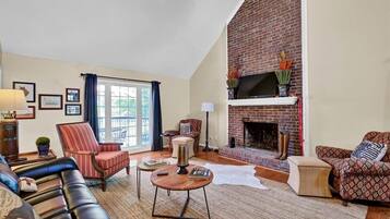 Smart TV, fireplace, books