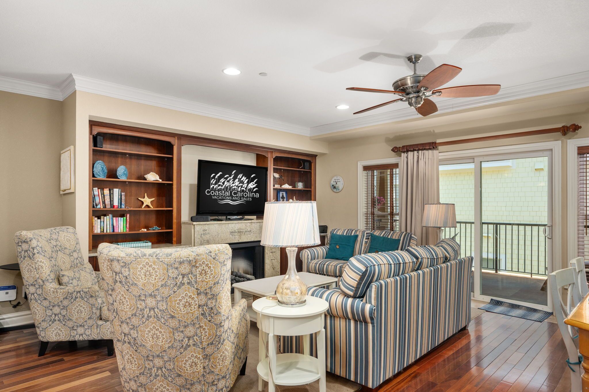 TV, fireplace, books, video library