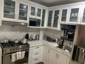 Fridge, microwave, oven, dishwasher