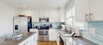 Updated three-story home with kayaks, bikes, & water views - great location
