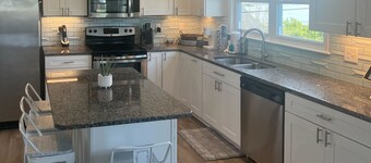 Updated three-story home with kayaks, bikes, & water views - great location