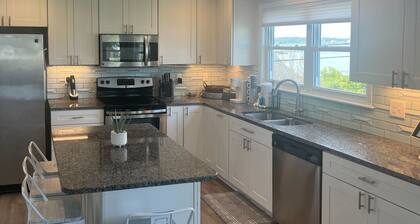 Updated three-story home with kayaks, bikes, & water views - great location